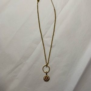Spartina gold-colored amulet necklace with charm. 17-19” adjustable.